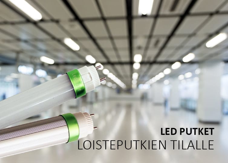 LOISTEPUTKI blogi banneri - LedStore Kaksi LED-putkea, joissa on vihreät korostukset, vasten epäselvää, tilavaa huonetta, jossa on ristikkokatto; Suomenkielinen teksti "LED PUTKET LOISTEPUTKIEN TILALLE.